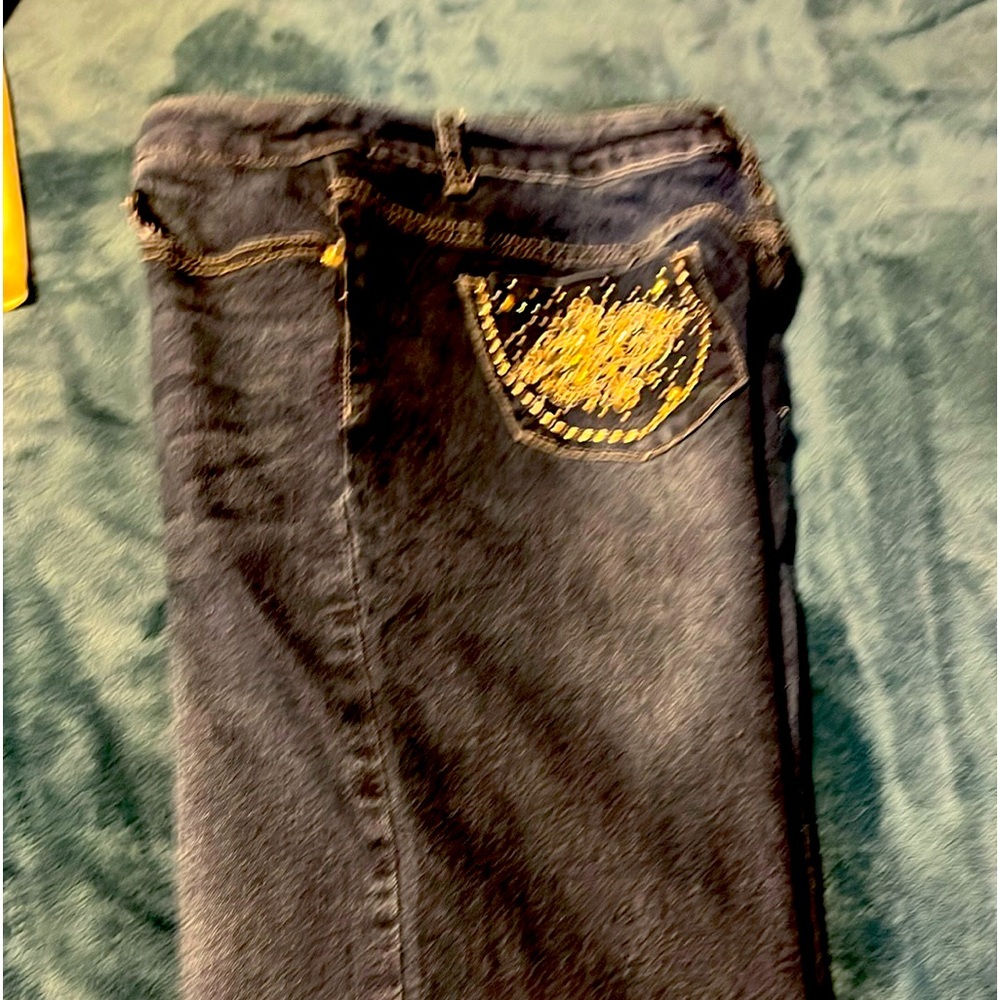 Women’s Dkin  jeans size 12 inseam is 31